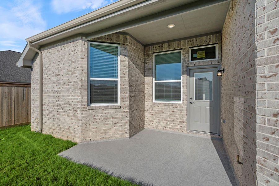 Exterior details and patio area of a home in Bridgeland, Cypress (Image 3).