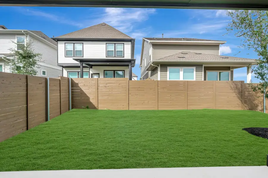 Exterior details and patio area of a home in Double Creek Crossing, Round Rock (Image 4).