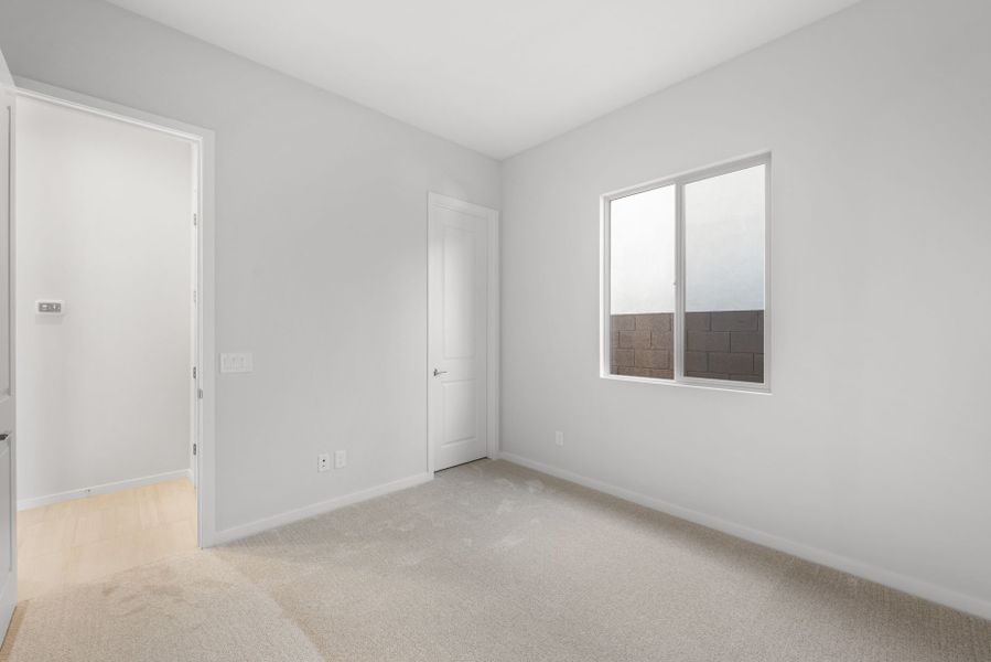 Spacious, unfurnished interior of a new home in Legado West, Queen Creek (Image 26).