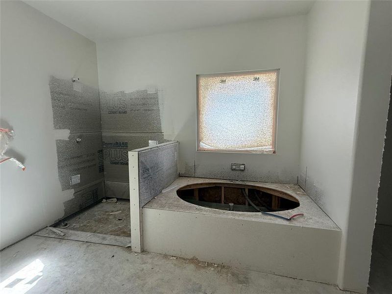 In-progress construction of a new home in Freeman Ranch, Weatherford, TX (Image 9).