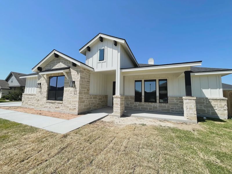 Representative exterior photo of a completed home built from the Carmel by Steve Klein Custom Builder in Escalera Ranch 1833, Victoria, TX (Image 18).