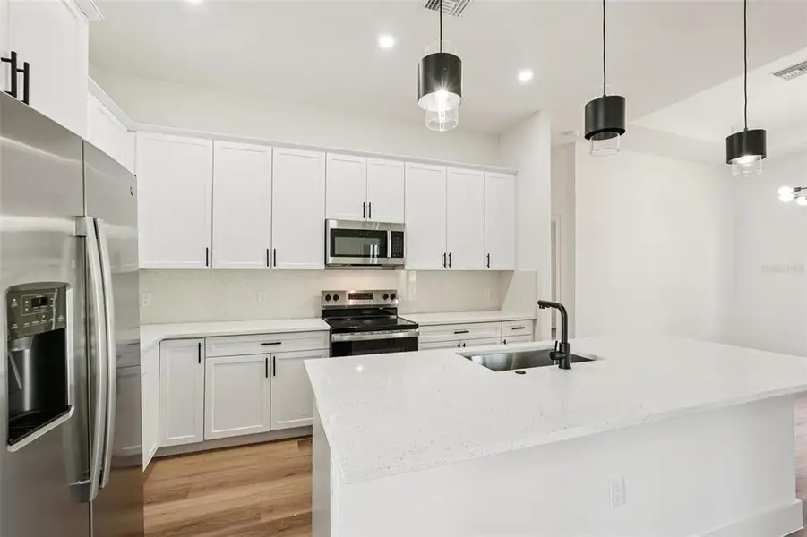 Furnished interior view inside a new home in , North Port (Image 11).