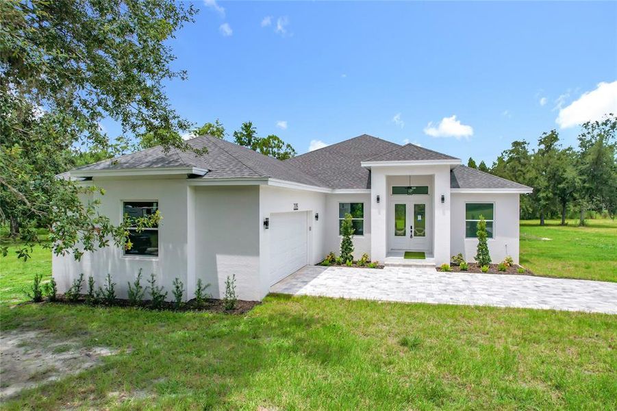 Front exterior of a new home in , Plant City, FL, highlighting curb appeal (Image 26).