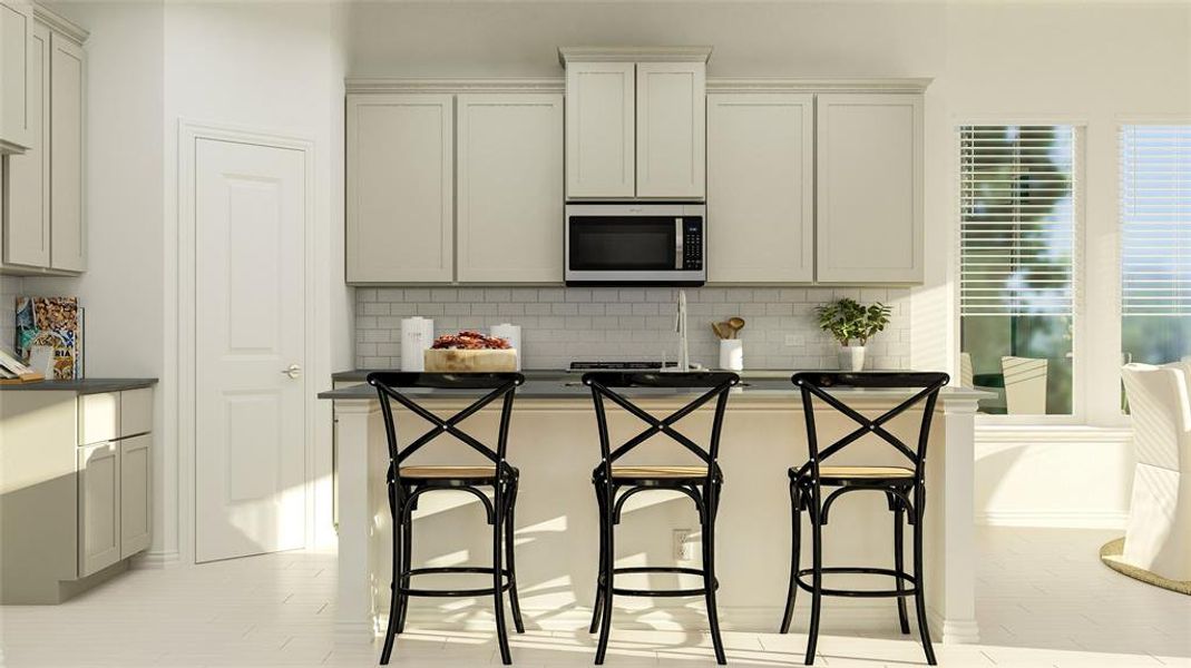 Kitchen featuring tasteful backsplash and light tile floors