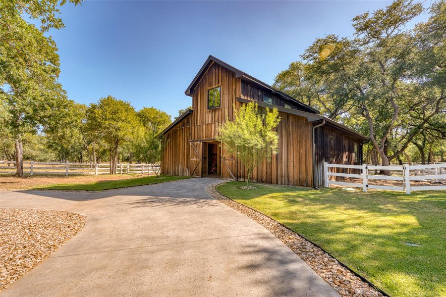 View of front of barn with 4 horse stalls, tack room, and guest quarters View of front of barn with 4 horse stalls, tack room, and guest quarters