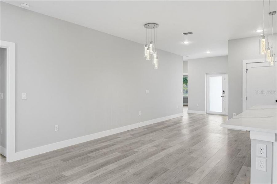 Spacious, unfurnished interior of a new home in , Port Charlotte (Image 24).