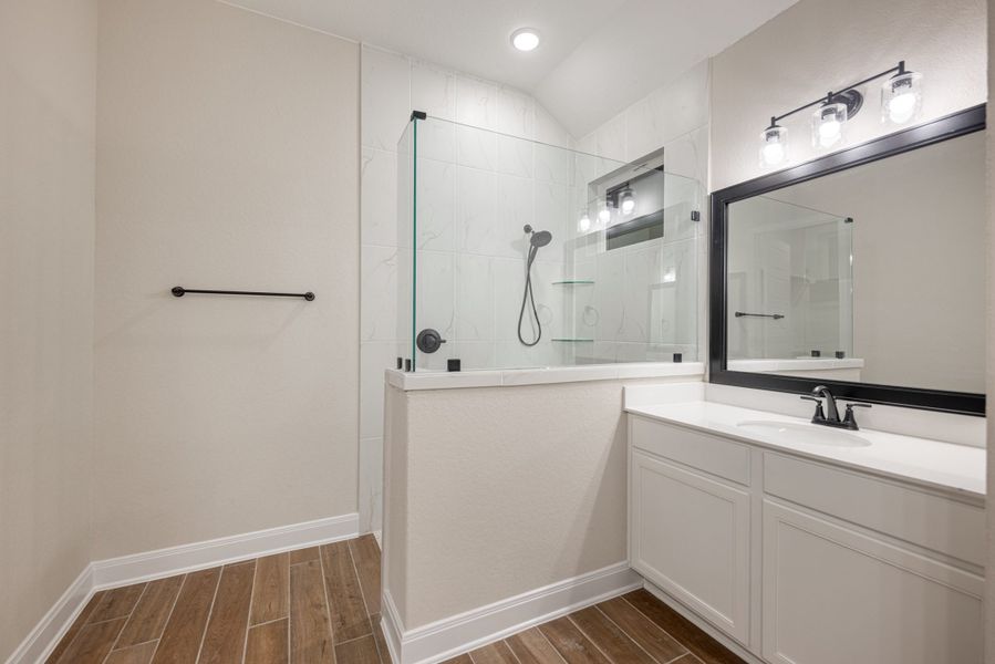 Representative furnished interior of a home built from the Mackenzie by Chesmar Homes in Sienna Lakes, San Antonio (Image 6).