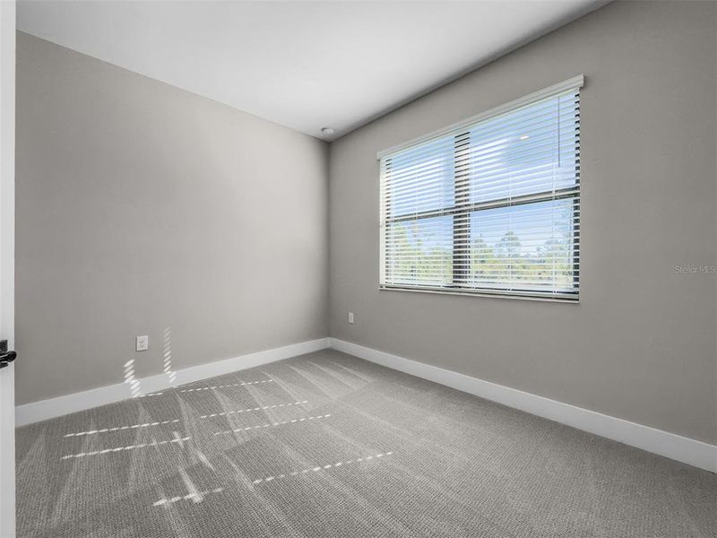 Spacious, unfurnished interior of a new home in , Port Charlotte (Image 10).