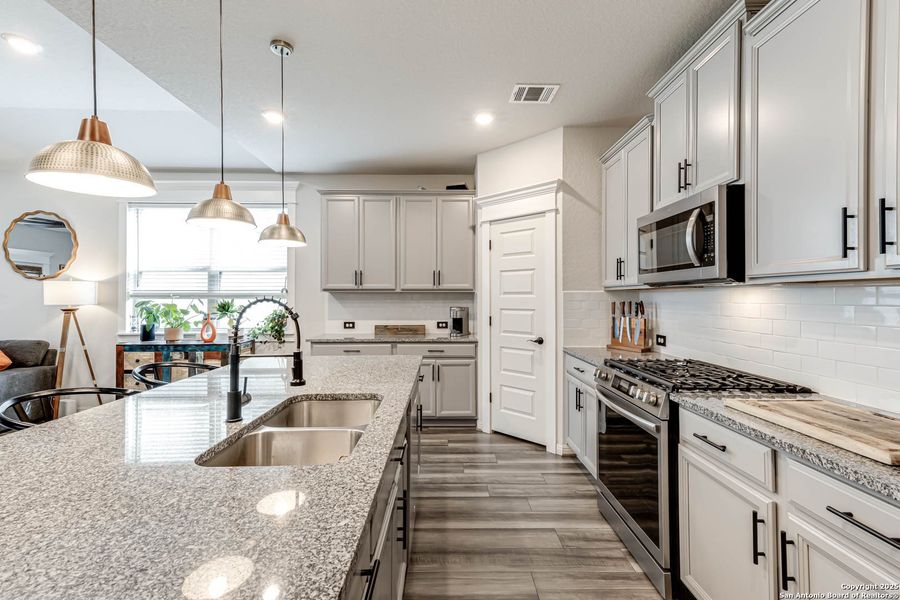 Furnished interior view inside a new home in Prescott Oaks, San Antonio (Image 38).