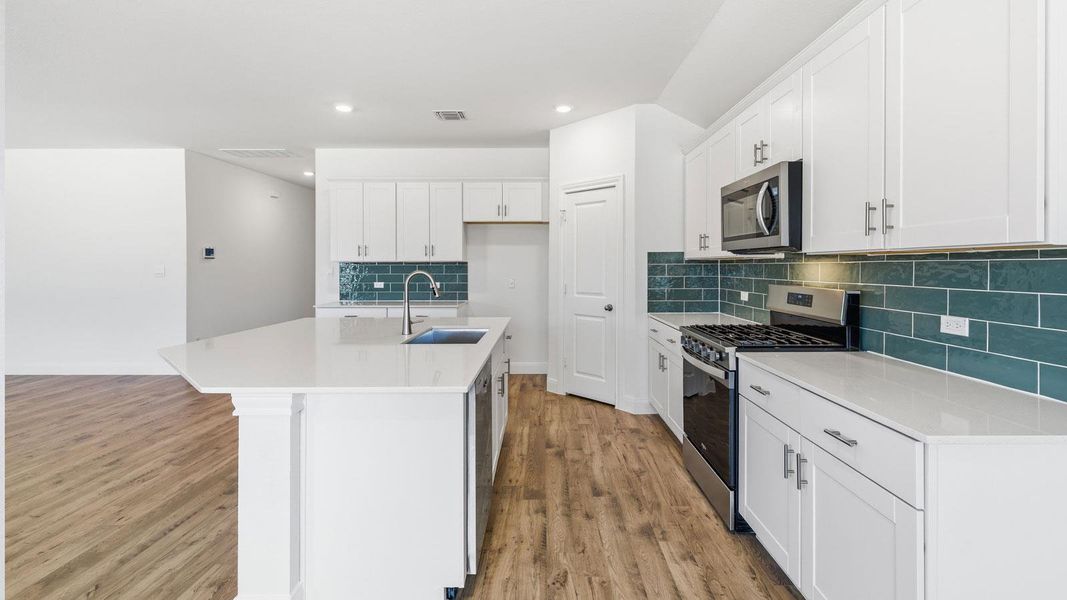 Furnished interior view inside a new home in Railhead, Cedar Creek (Image 3).