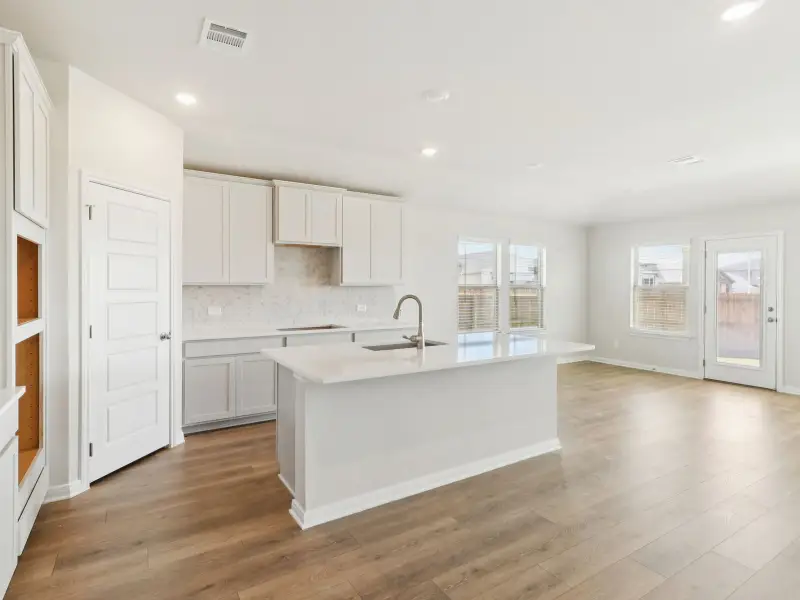 Furnished interior view inside a new home in Legendary Trails - Classic Series, Cibolo (Image 9).