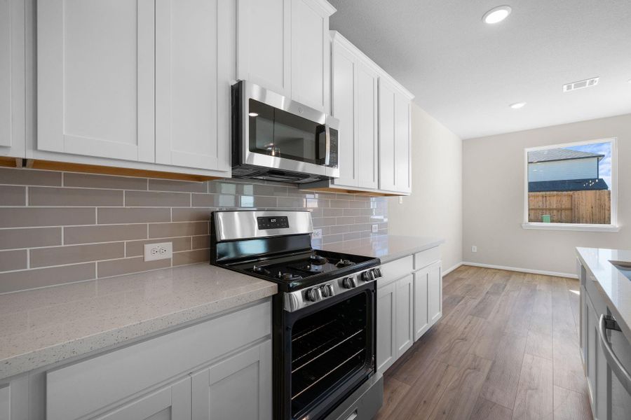 This kitchen is not only a functional space but also has ample storage. Whether you're a seasoned chef or just love to gather and enjoy good food, this kitchen is a dream come true.