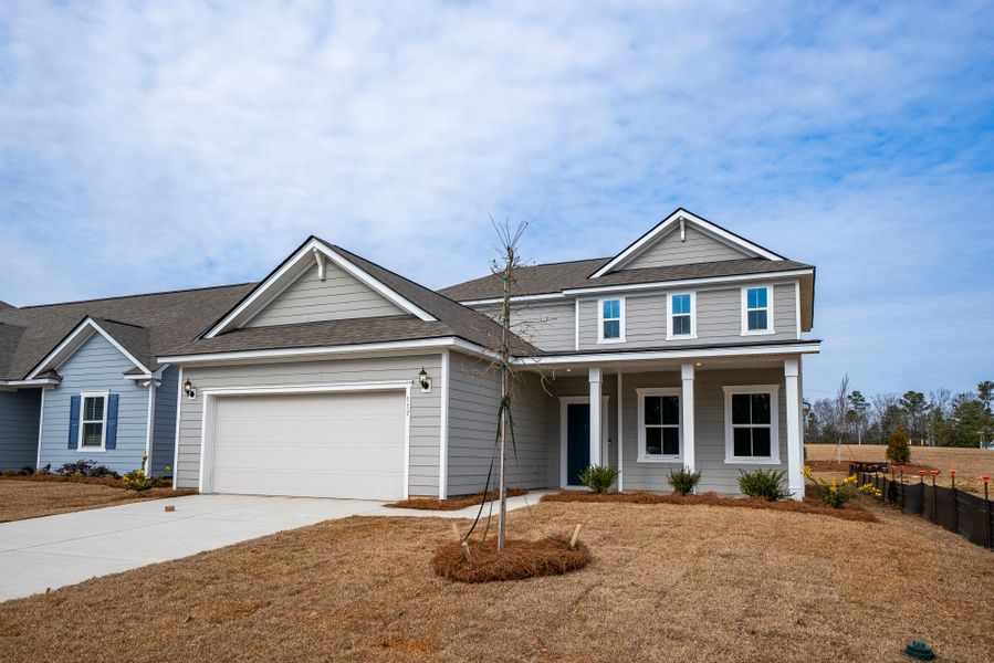 Front exterior of a new home in Monroe Preserve, Chapin, SC, highlighting curb appeal (Image 25).