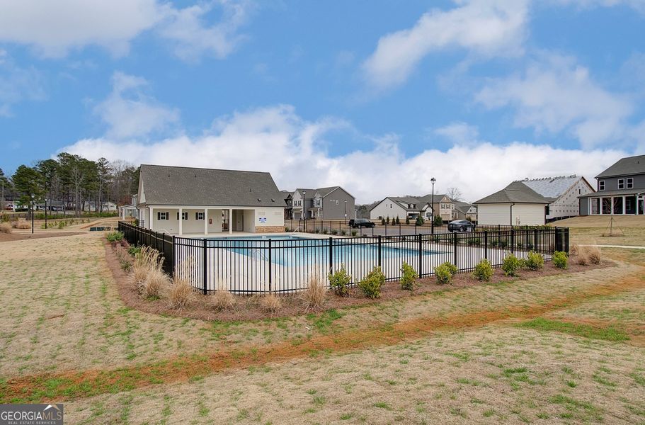 Front exterior of a new home in Ponderosa Farms Manor, Gainesville, GA, highlighting curb appeal (Image 25).
