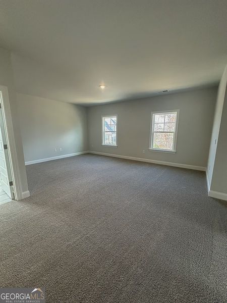 Spacious, unfurnished interior of a new home in Mirror Lake at South Harbour, Villa Rica (Image 17).