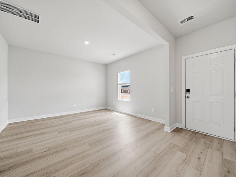 Spacious, unfurnished interior of a new home in The Farm at Wells Creek - Signature Collection, Gray Court (Image 8).