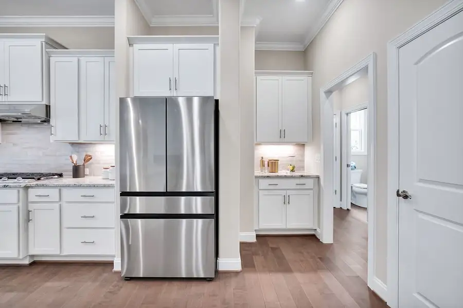 Furnished interior view inside a new home in The Bluffs On the Cape Fear, Leland (Image 8).