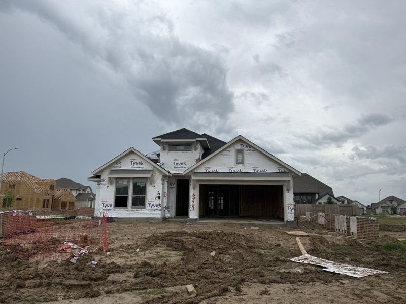 In-progress construction of a new home in Valencia, Manvel, TX (Image 3). In-progress construction of a new home in Valencia, Manvel, TX (Image 3).