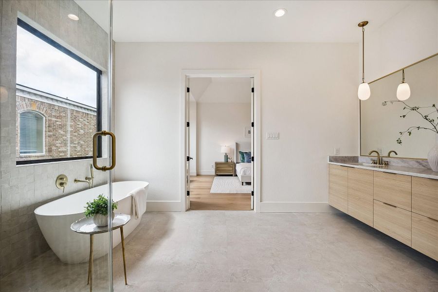 Double French door connects bedroom to bath. Double French door connects bedroom to bath.