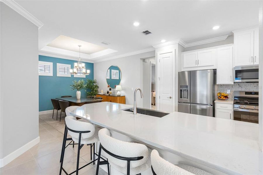 Furnished interior view inside a new home in Esplanade at Wiregrass Ranch, Wesley Chapel (Image 13).