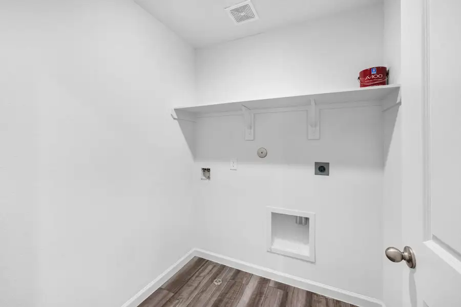 Laundry room conveniently located upstairs near all of the bedrooms.