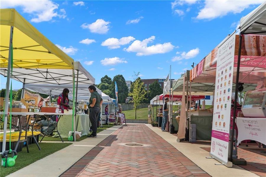 Front exterior of a new home in Millcroft Townhomes, Buford, GA, highlighting curb appeal (Image 24).