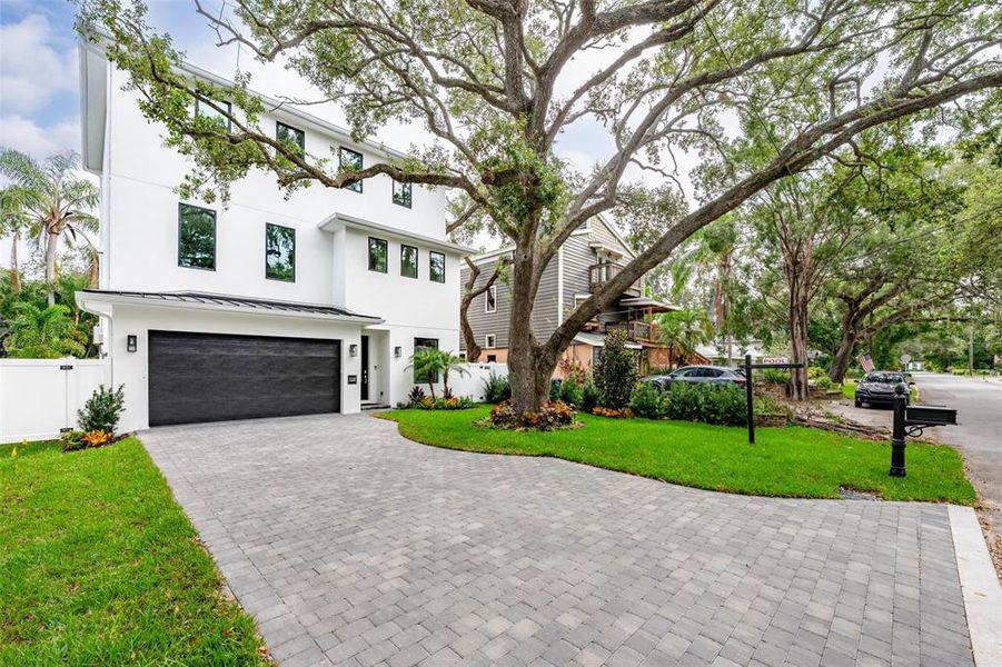 Front exterior of a new home in , Tampa, FL, highlighting curb appeal (Image 1).