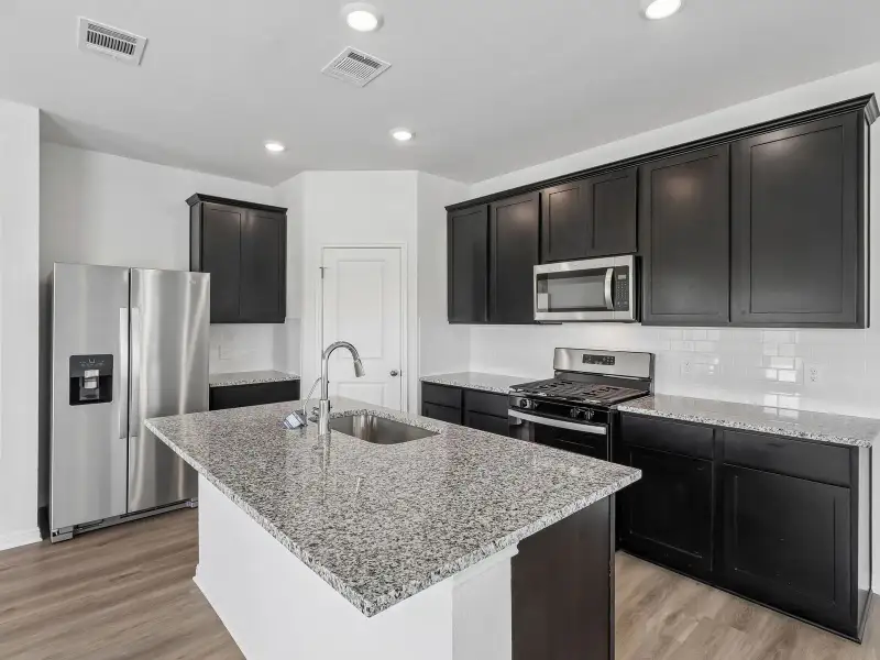 Furnished interior view inside a new home in Pfennig Place, Pflugerville (Image 5).