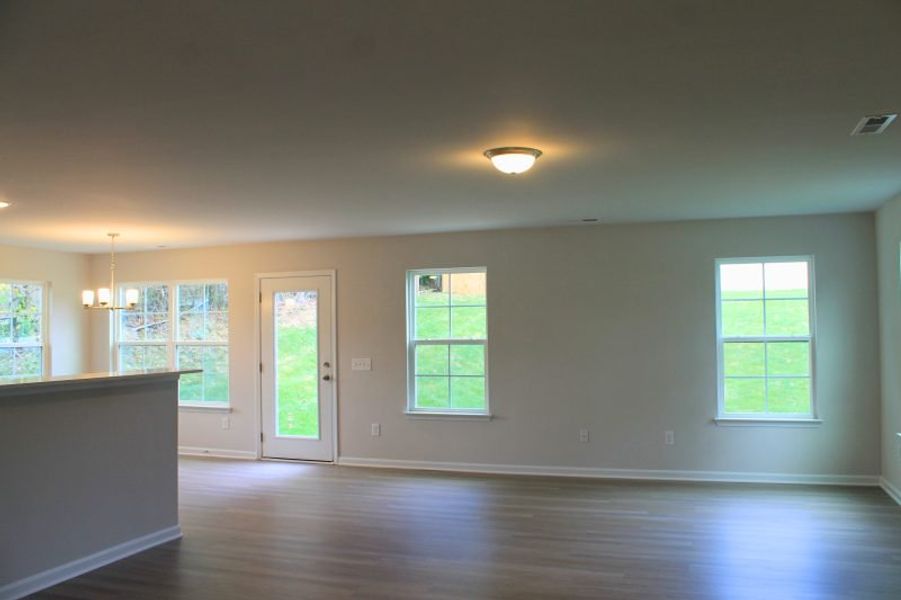 Spacious, unfurnished interior of a new home in The Wilcox, Greensboro (Image 18).