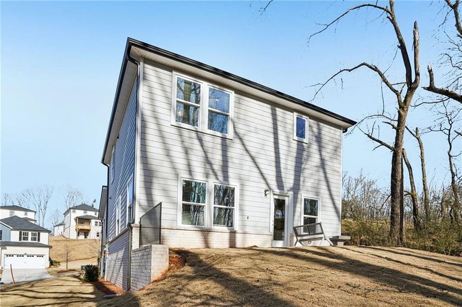 Exterior details and patio area of a home in Hemingway - Reserve Series, Cumming (Image 27). Exterior details and patio area of a home in Hemingway - Reserve Series, Cumming (Image 27).