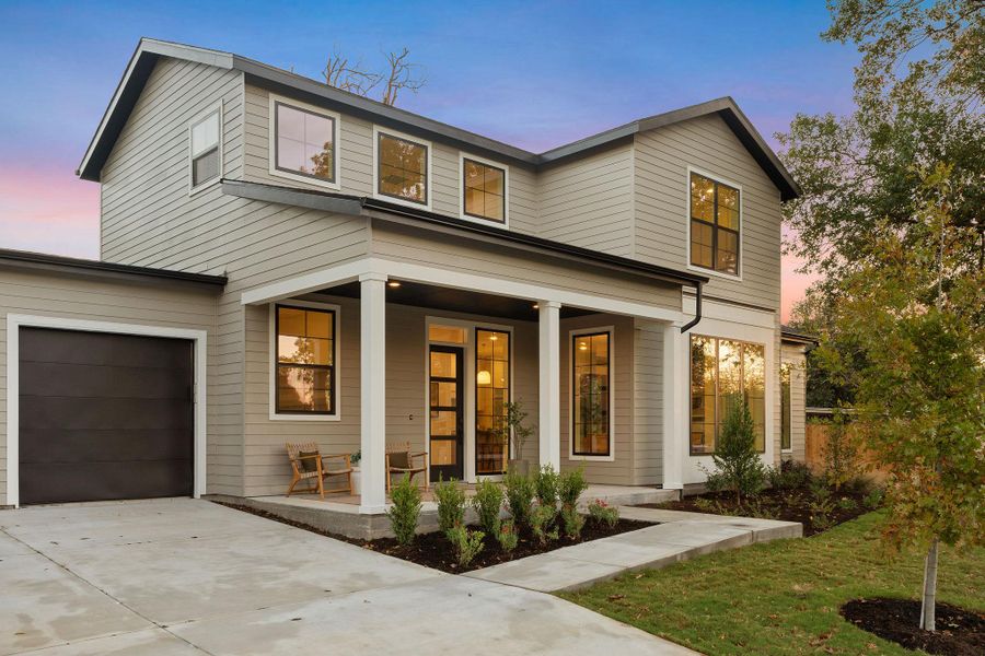 View of front of house with covered porch and concrete driveway View of front of house with covered porch and concrete driveway
