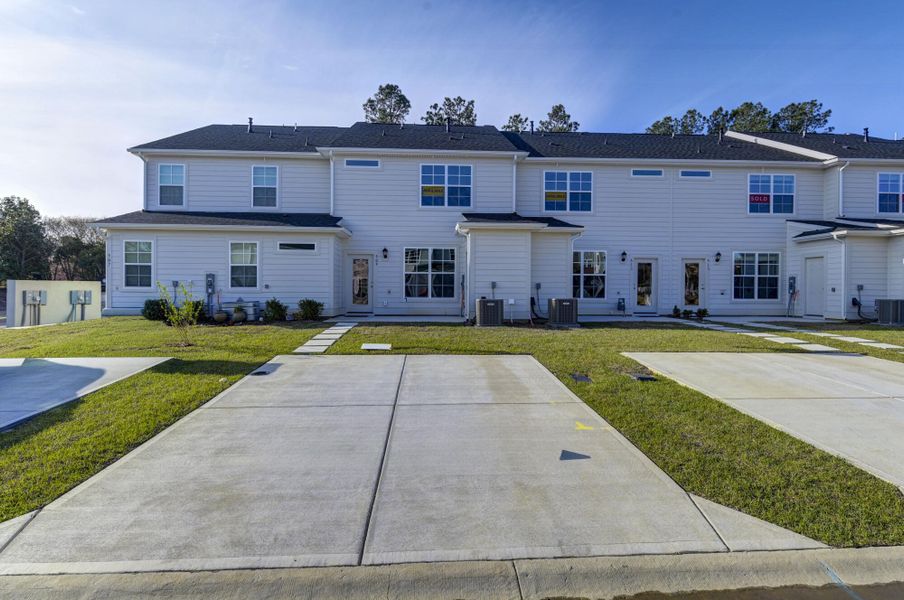 Front exterior of a new home in Lake Carolina Townhomes, Columbia, SC, highlighting curb appeal (Image 25).