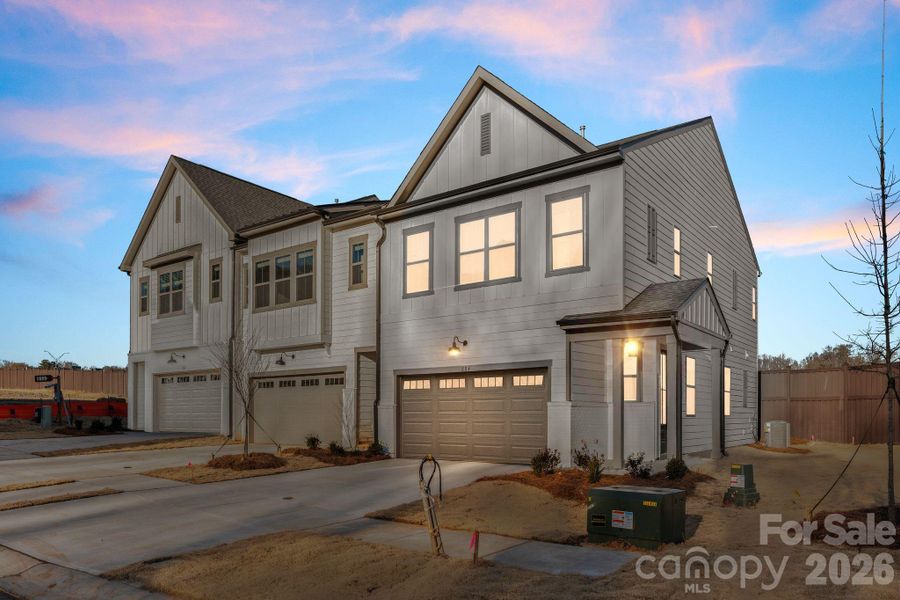 Front exterior of a new home in , Charlotte, NC, highlighting curb appeal (Image 1). Front exterior of a new home in , Charlotte, NC, highlighting curb appeal (Image 1).