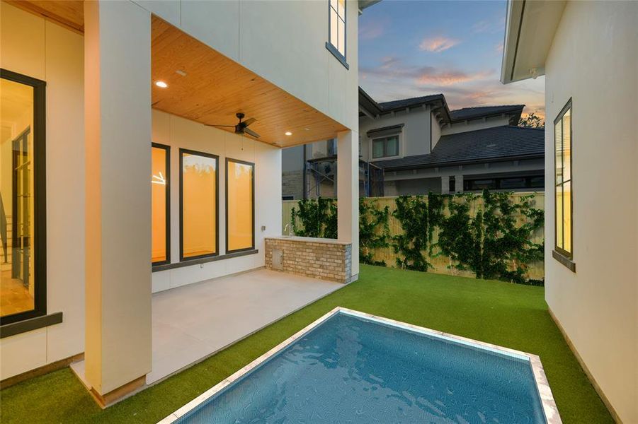 Another view of the backyard with pool rendering showcasing the versatility of this space.  There is an additional space at the rear of the property perfect for a dog run, vegetable garden or playscape.