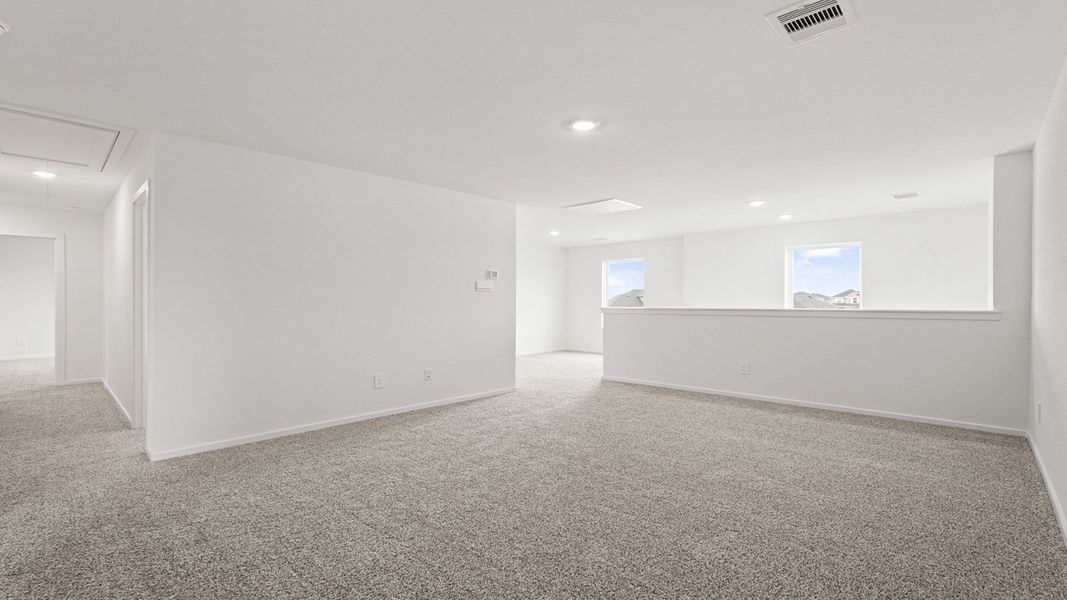 Spacious, unfurnished interior of a new home in Sunterra, Katy (Image 16).