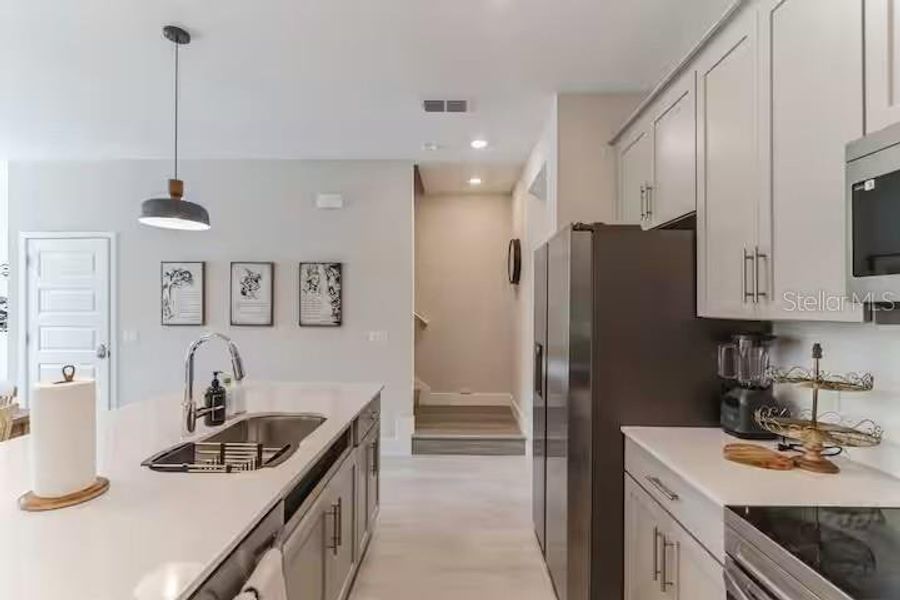 Furnished interior view inside a new home in , Reunion (Image 14).