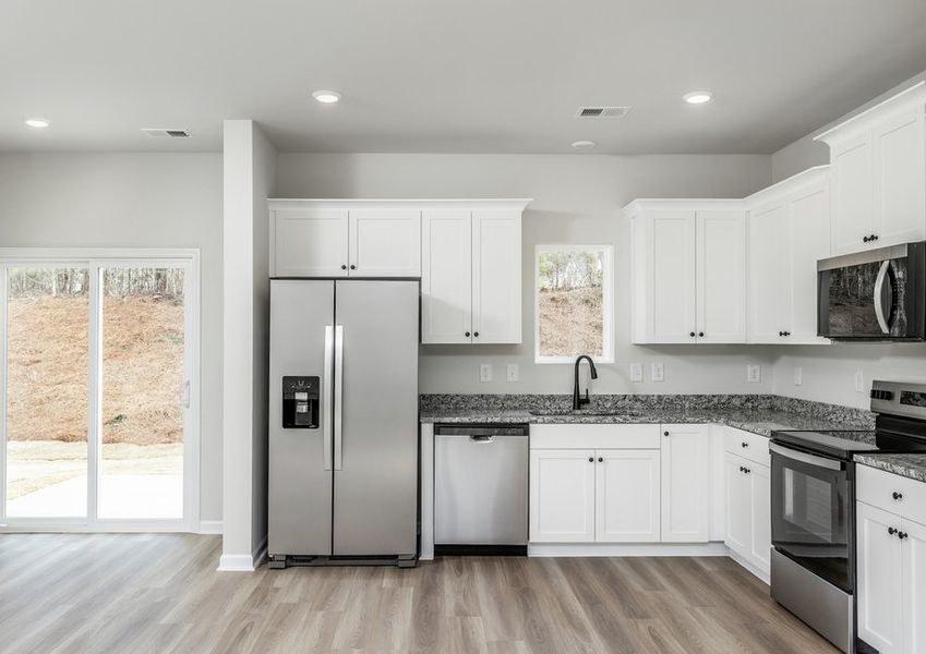 Each kitchen comes with stainless steel appliances. Each kitchen comes with stainless steel appliances.