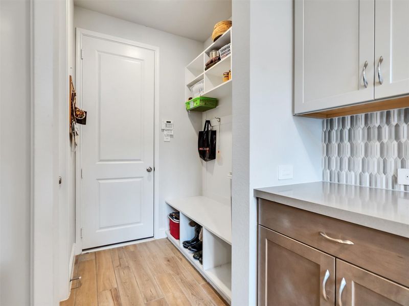Mud-room with custom-built shelves