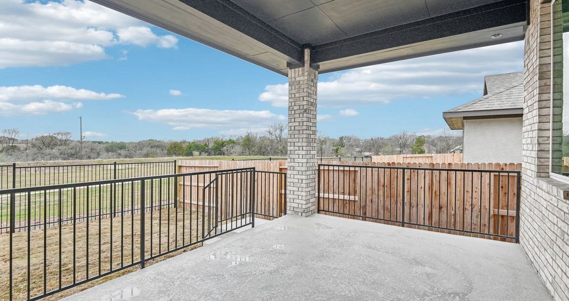 Exterior details and patio area of a home in Village at Three Oaks, Seguin (Image 3). Exterior details and patio area of a home in Village at Three Oaks, Seguin (Image 3).