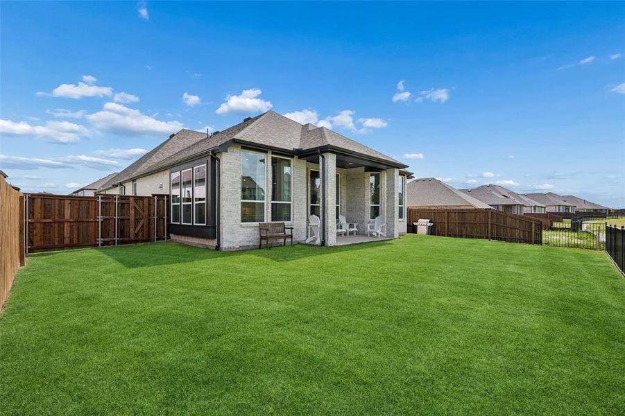 Exterior details and patio area of a home in Devonshire, Forney (Image 4).