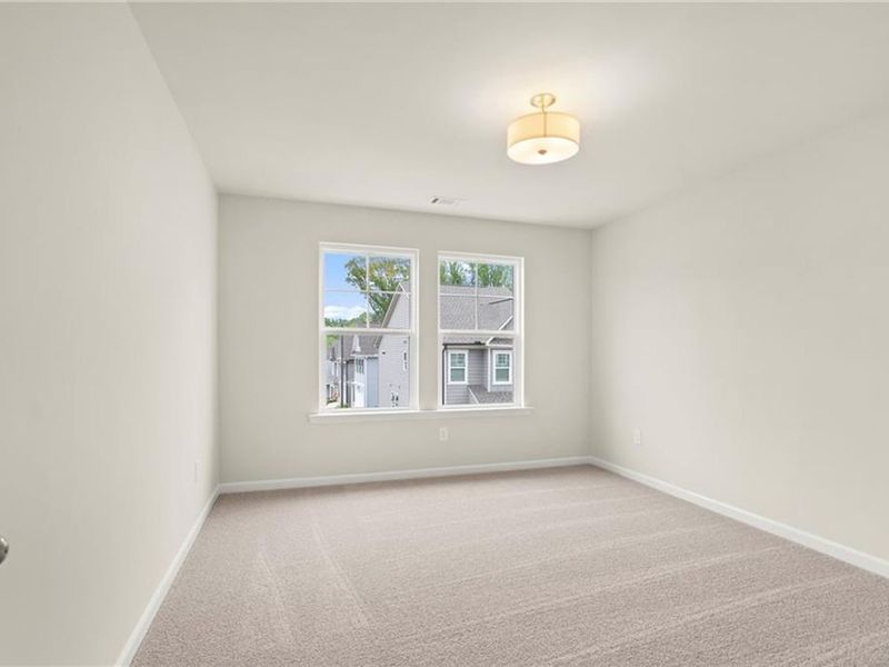 Spacious, unfurnished interior of a new home in The Village at Shallowford, Kennesaw (Image 31).