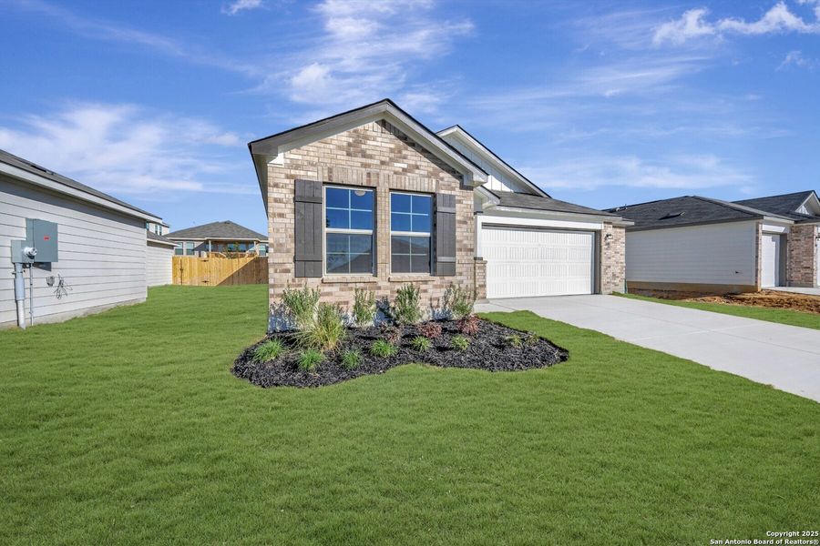 Front exterior of a new home in Greenspoint Heights, Seguin, TX, highlighting curb appeal (Image 1).
