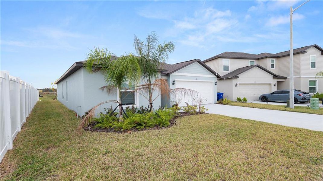 Front exterior of a new home in Cypress Point at Lake Parker: The Estates, Lakeland, FL, highlighting curb appeal (Image 28).