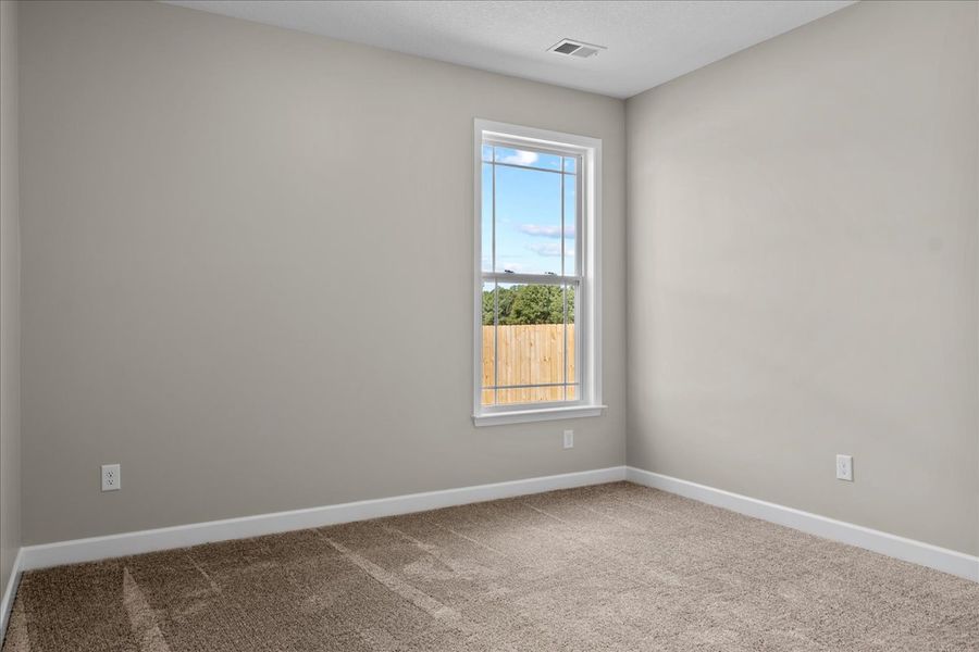 Representative unfurnished interior of a home built from the Cherokee by Enchanted Homes in Lonesome Dove, San Antonio (Image 35).