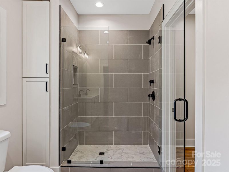 Primary Bathroom Shower - Custom Glass Enclosure - Tile Surround