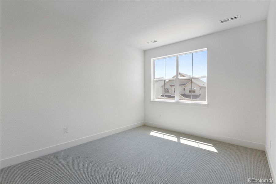 Spacious, unfurnished interior of a new home in Dillon Pointe - Journey, Broomfield (Image 15).