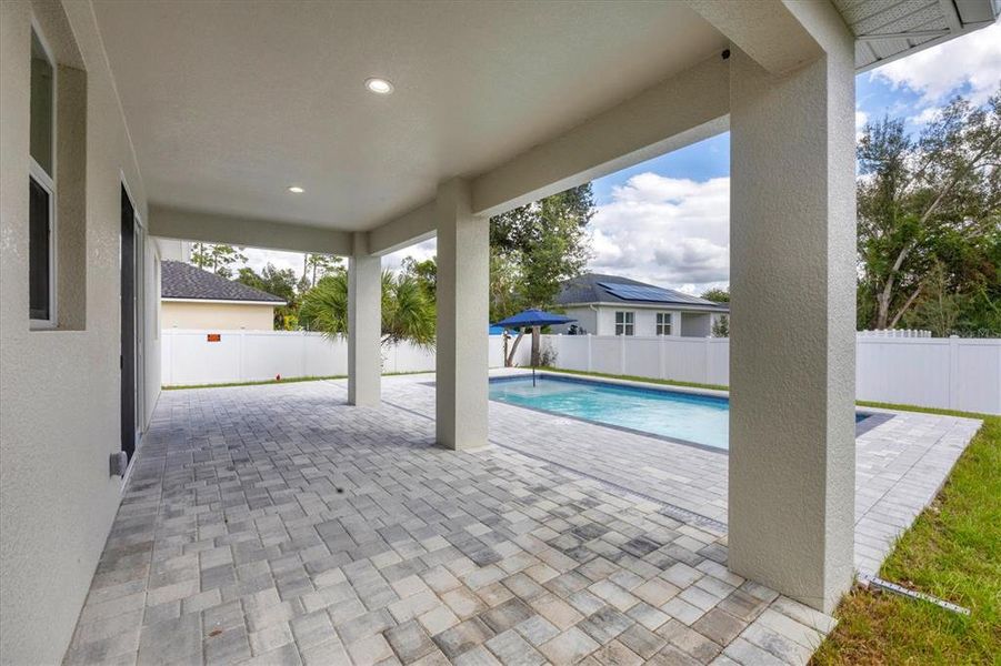 Exterior details and patio area of a home in , North Port (Image 24).