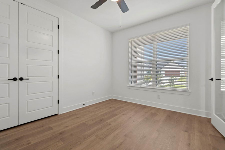 The downstairs flex room is perfect for a home office.