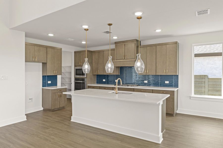 Furnished interior view inside a new home in Union Park, Little Elm (Image 6).
