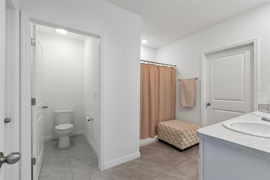 Furnished interior view inside a new home in Farm at Varrea, Plant City (Image 24).